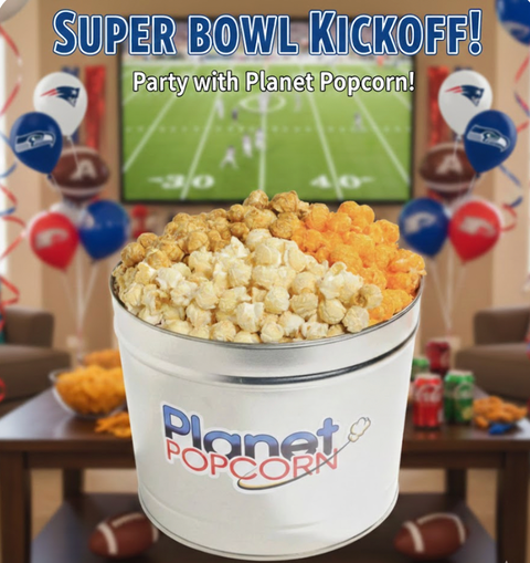Planet Popcorn bucket with popcorn in front of a Super Bowl-themed setup