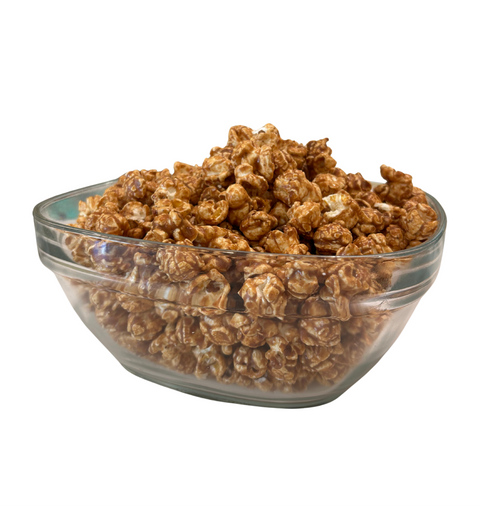 Glass bowl filled with pumpkin spice popcorn 