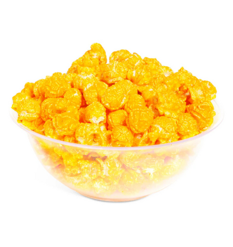 Yellow cereal in a clear bowl on a white background